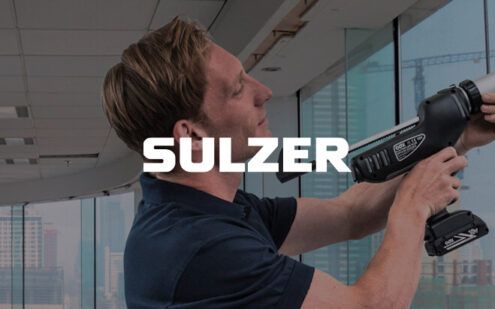 Sulzer logo overlayed onto someone using a dispenser